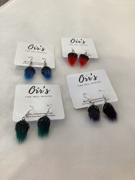 Orr’s Time well wasted studio seal skin earrings